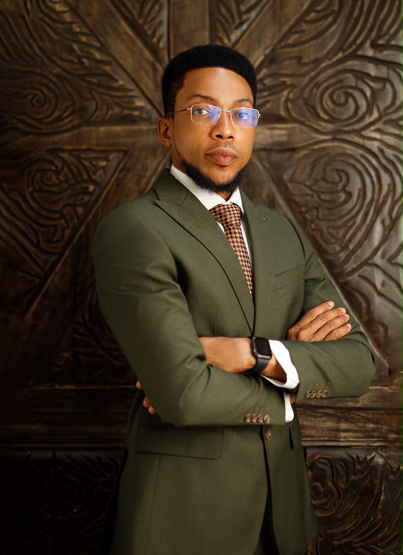 Against carved wood backdrop